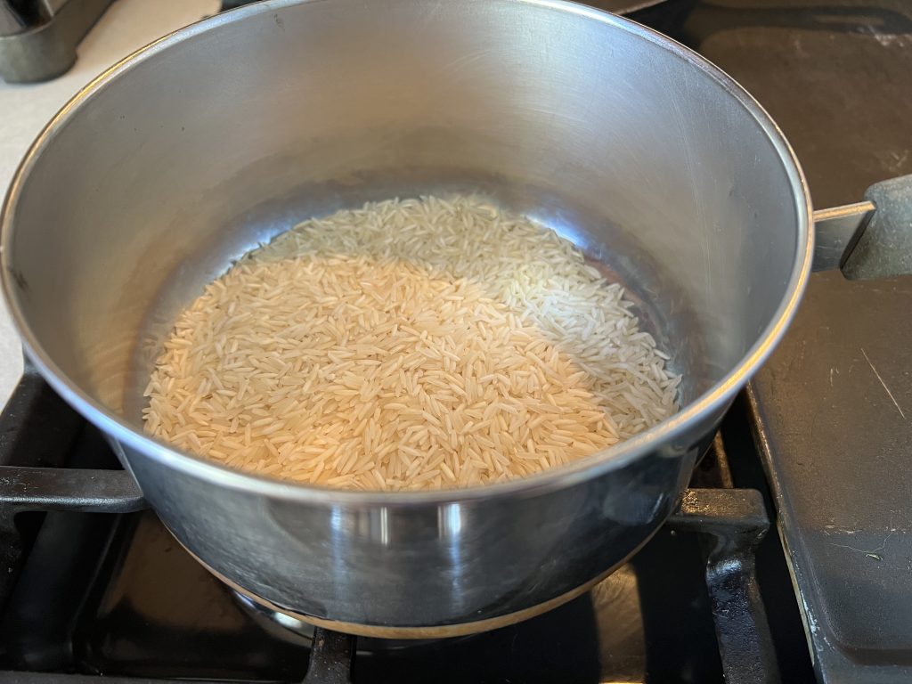 rice in saucepan for mock duck