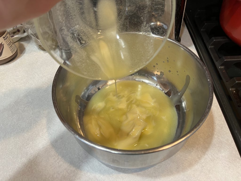 pouring butter into bowl