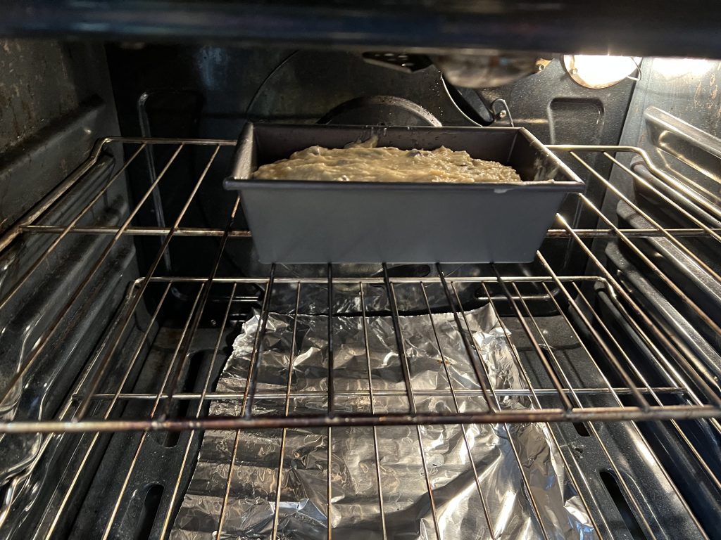 banana bread cooking in oven
