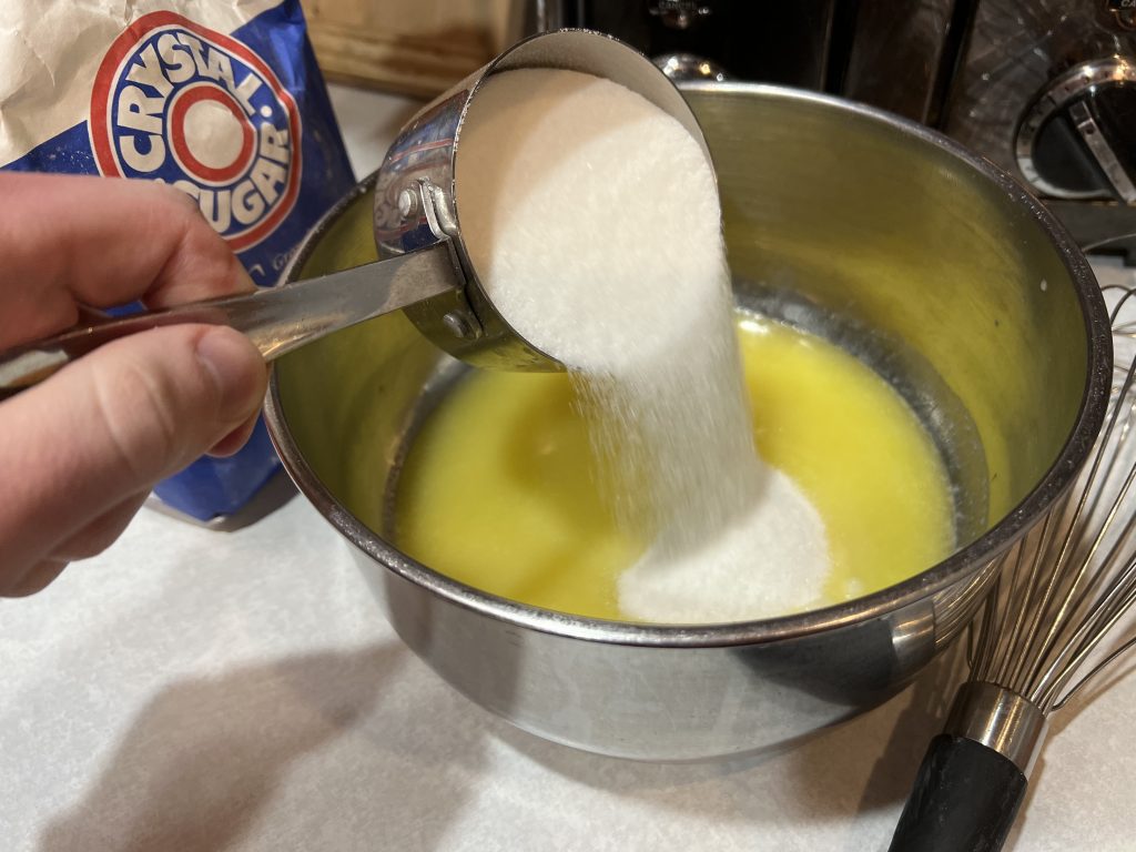 Putting sugar in cookie mix