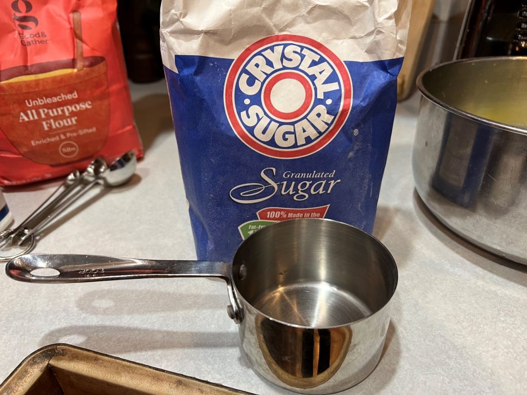 Sugar and measuring cup for cookie mix