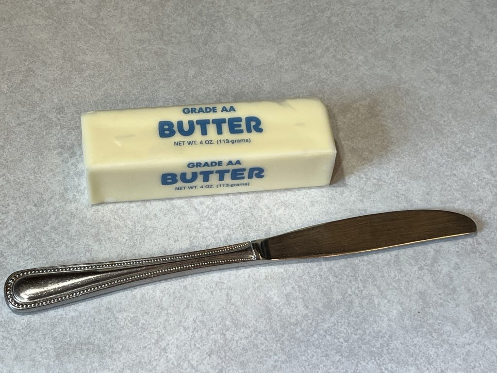 butter knife and butter for Rice Krispie Treat Recipe