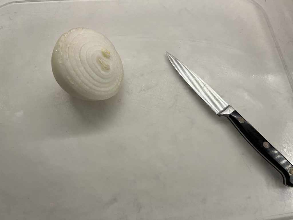 chopping onion for meatloaf recipe
