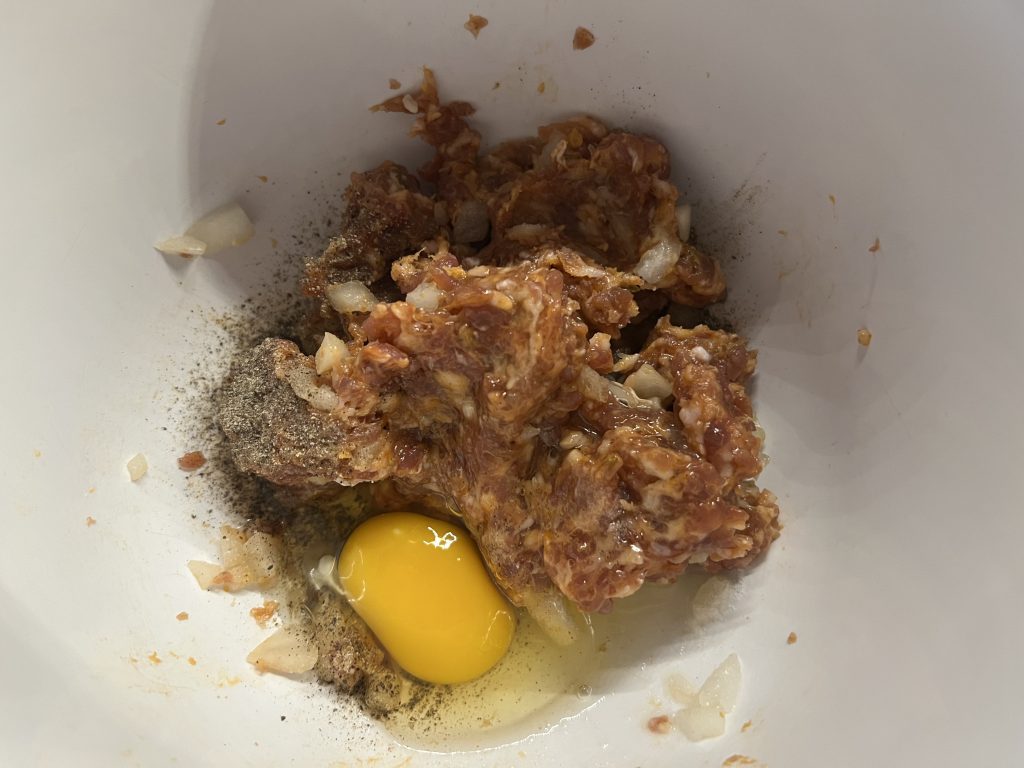 egg in bowl for meatloaf recipe