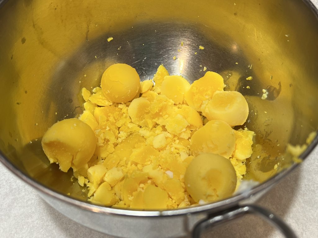 egg yolks in mixing bowl for deviled eggs recipe