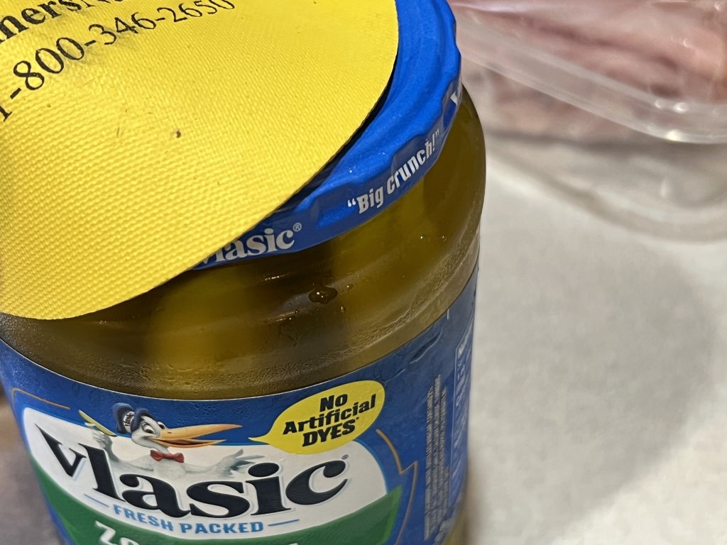opening a jar of pickles for Minnesota sushi recipe