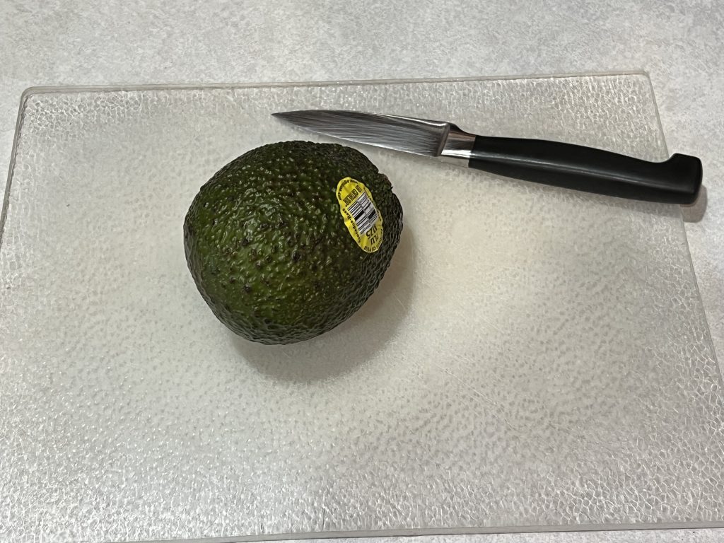 chopping up an avocado