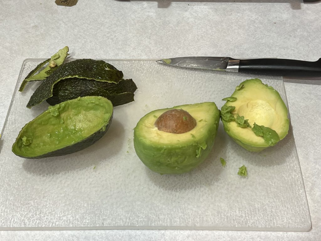 taking the pit out of an avocado