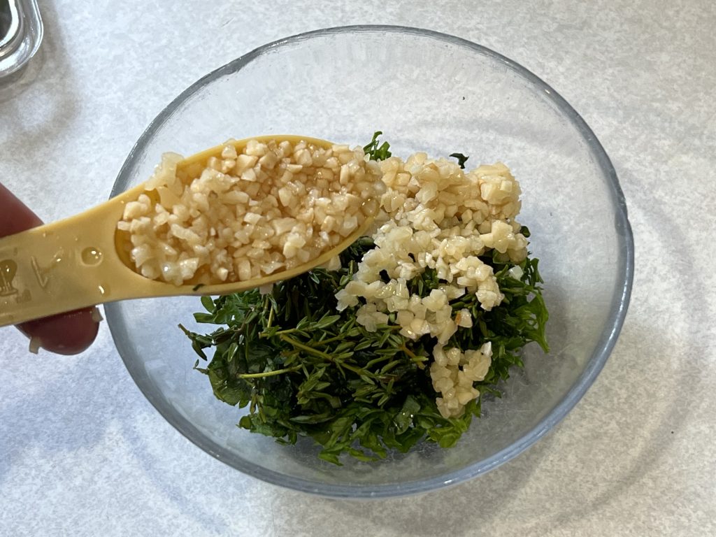 tablespoon of garlic into the greens
