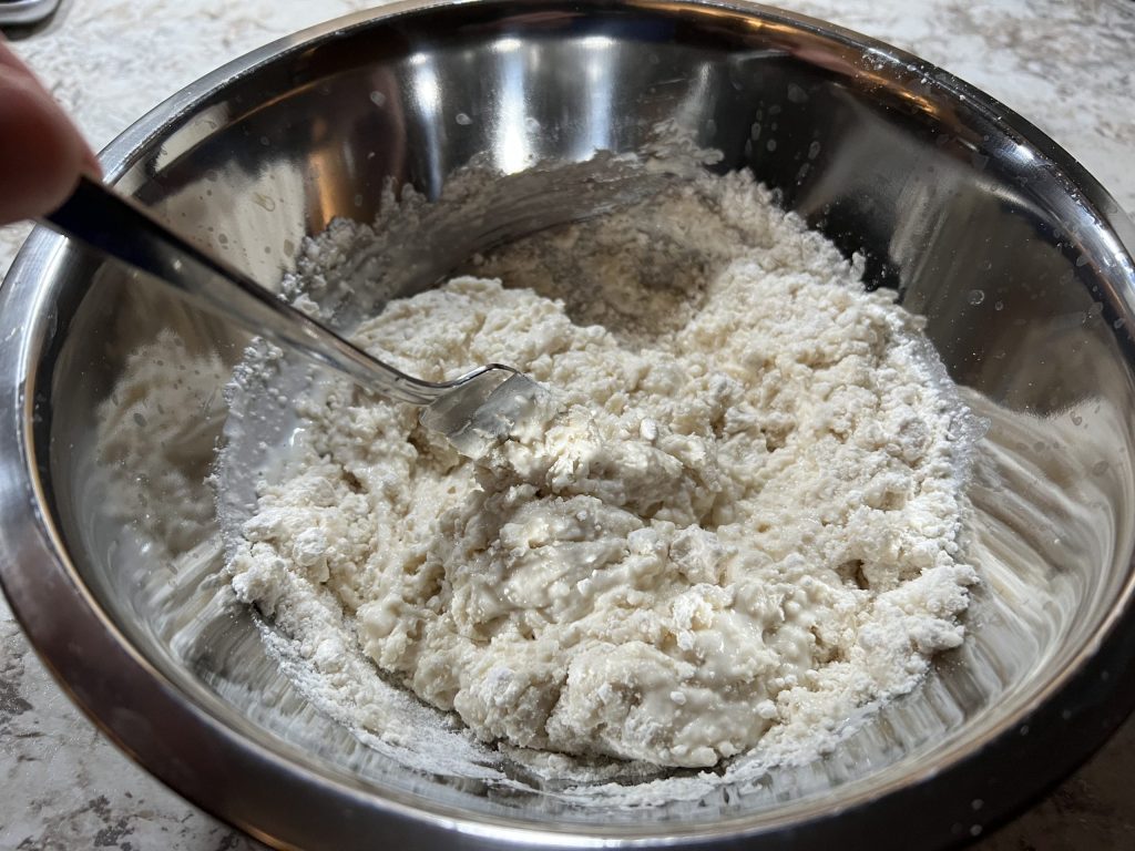 Mixing flour around with a fork