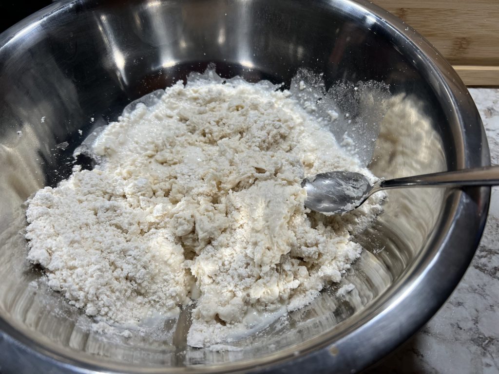 mixing biscuit ingredients together
