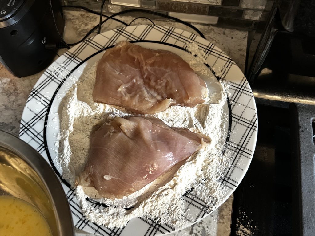 coating chicken breasts in flour