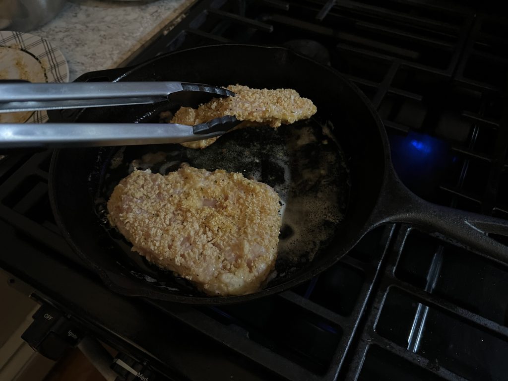 turning chicken for chicken parmesan recipe